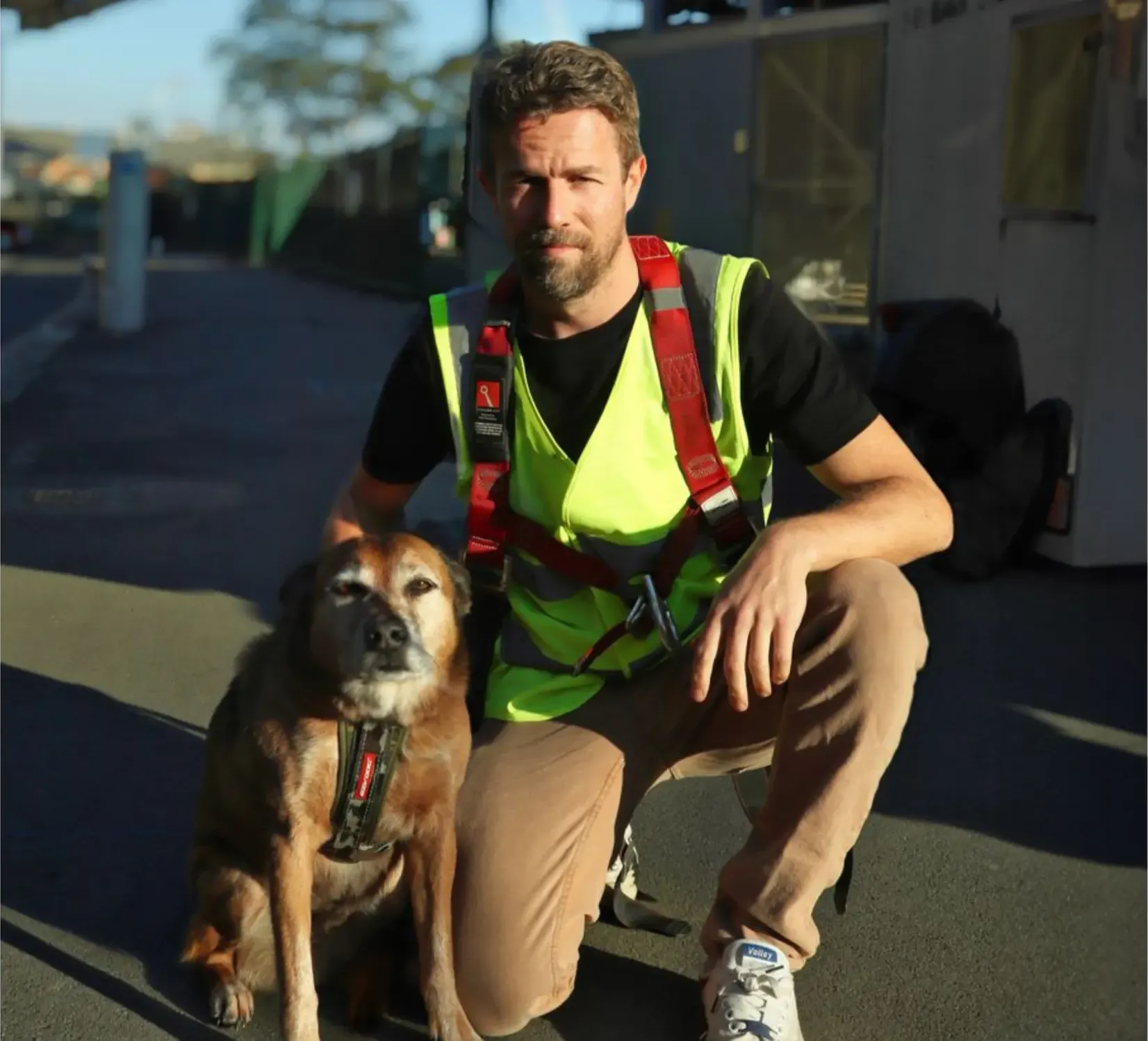 Mitch from Sky Dog Roofing with Mike the dog on site